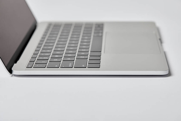 selective focus of laptop with copy space on grey  - Foto, Imagem