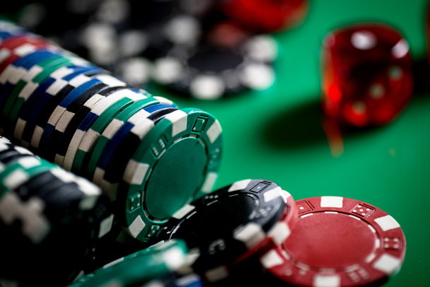 Close up of colorful gaming poker chips - Foto, Imagen