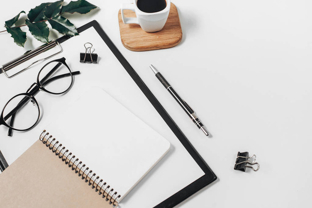 Home office workspace mockup with blank clip board, office suppl - Photo, image