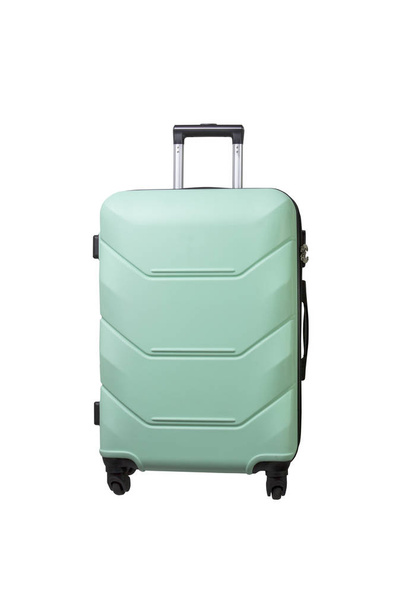 Suitcase on wheels light green color on a white isolated background - Foto, Imagen