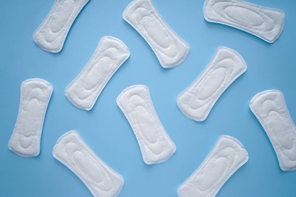Menstrual pads on color background, top view - Valokuva, kuva