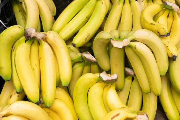Fresh banana yellow background in the fruit market - Photo, Image