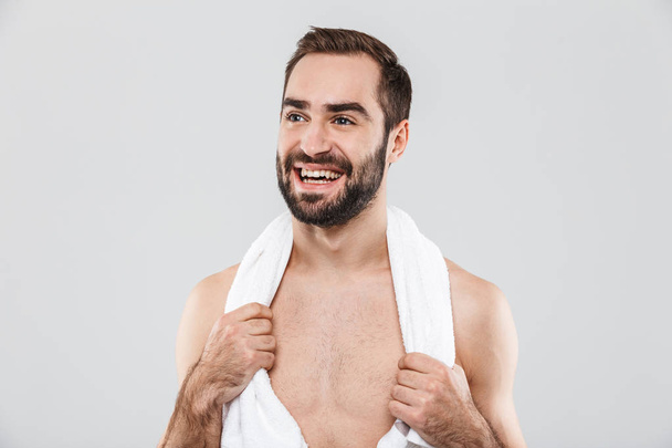 Close up of a young handsome bearded shirtless man - Photo, Image
