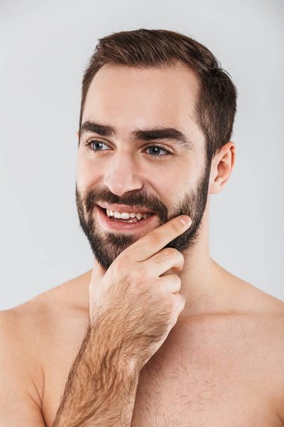 Close up of a young handsome bearded shirtless man - Φωτογραφία, εικόνα