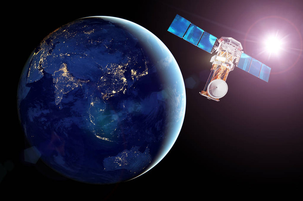 Satellite de communication en orbite terrestre, vue du côté nuit de la planète, villes nocturnes lumineuses et soleil éclatant. Éléments de cette image fournis par la NASA
. - Photo, image