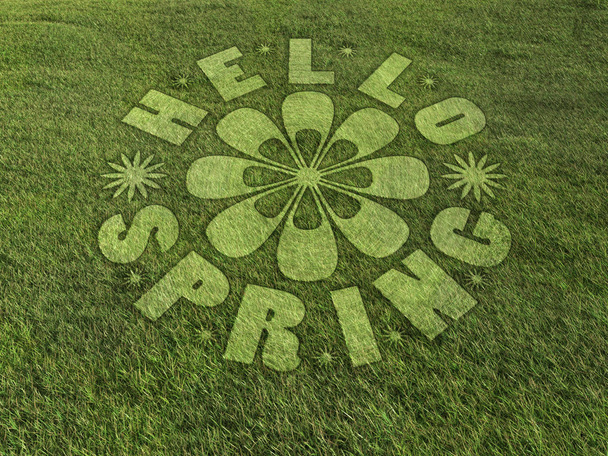 Hello Spring crop circle made on grassy meadow - Photo, Image