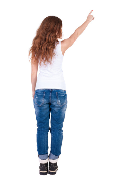 Back view of pointing woman - Zdjęcie, obraz
