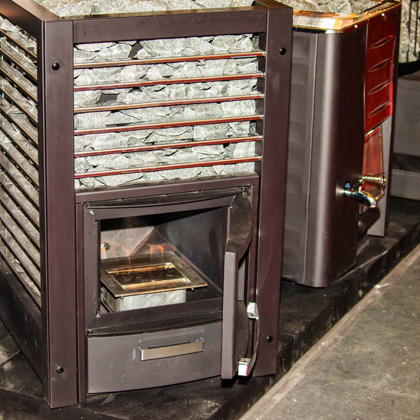Different types of new wood stoves for saunas - Photo, Image