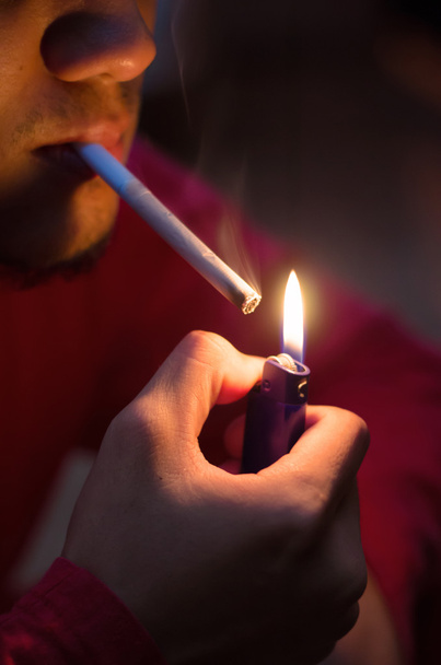 Lighting up cigarette - Фото, зображення