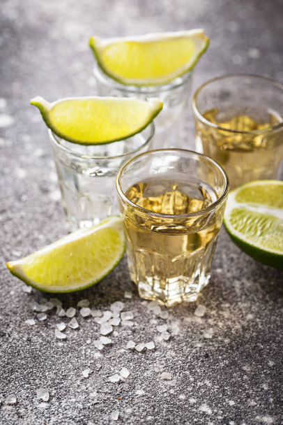 Shots of silver and gold tequila - Fotografie, Obrázek