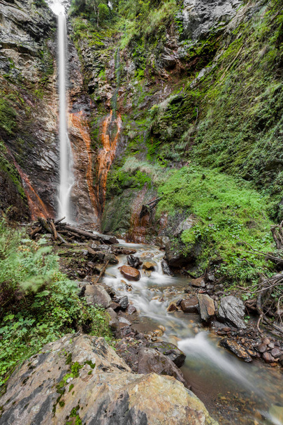 small waterfall among the forest in val di Funes - Photo, Image