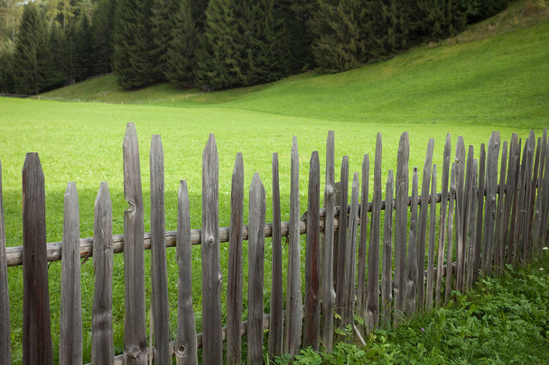 Wooden fence from a pasture in Val di Funes in Italy - Foto, immagini