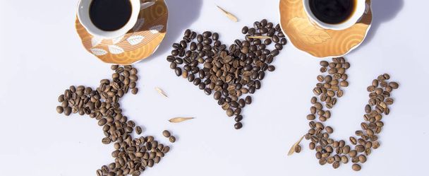 Kávová zrna a pohárky dekorace - Fotografie, Obrázek