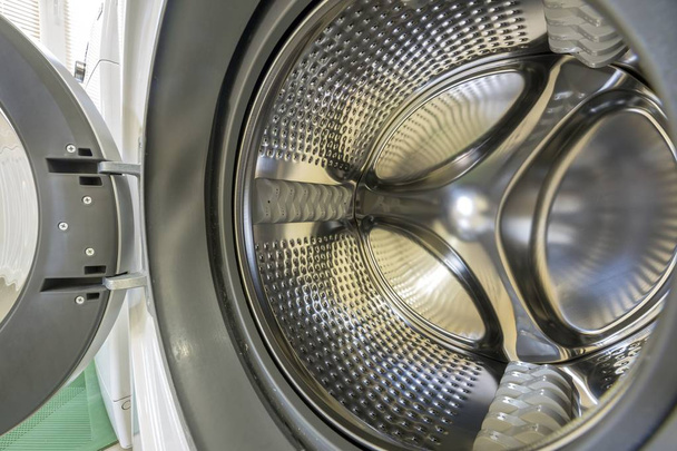 Close-up detail of modern washing machine interior with open doo - Photo, Image