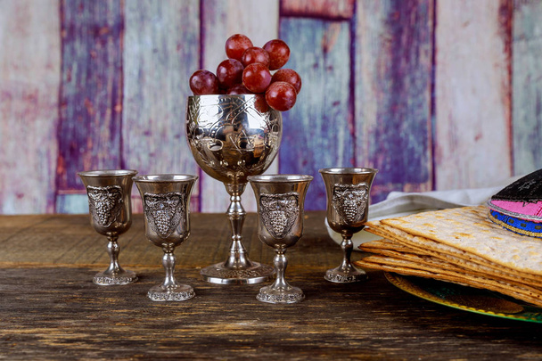 Red kosher wine four of matzah or matza Passover Haggadah - Photo, Image