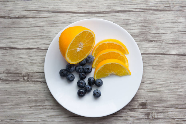  Fruit on white plate - Photo, Image