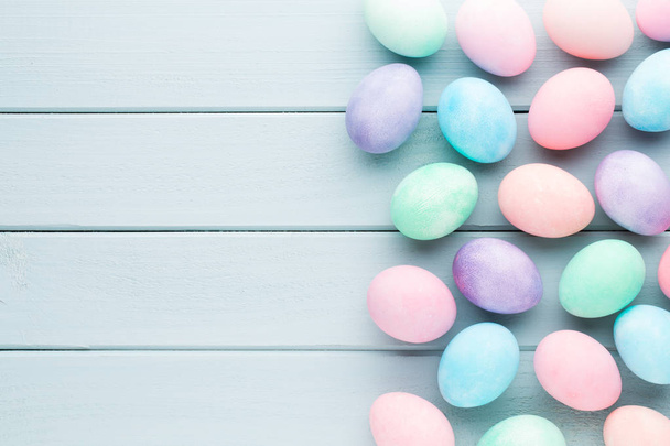 Pastel Easter eggs background. Spring greating card. - Fotó, kép