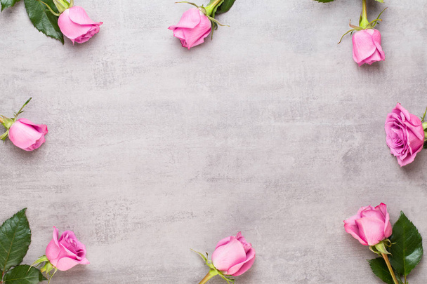 Flowers valentine day composition. Frame made of pink rose on gr - Φωτογραφία, εικόνα