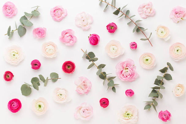 Beautiful colored ranunculus flowers on a white background.Sprin - Foto, imagen
