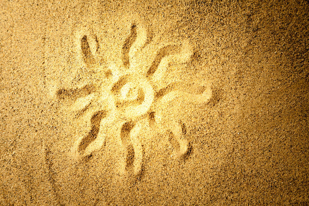 Сонце на піску
 - Фото, зображення