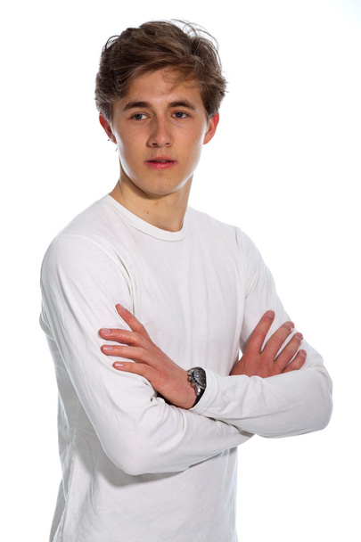 Young smiling casual man wearing white shirt isolated on white. - Fotoğraf, Görsel