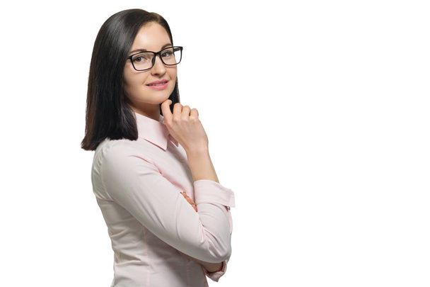 Confident young business woman in glasses pink shirt on white isolated background, copy space - Fotoğraf, Görsel