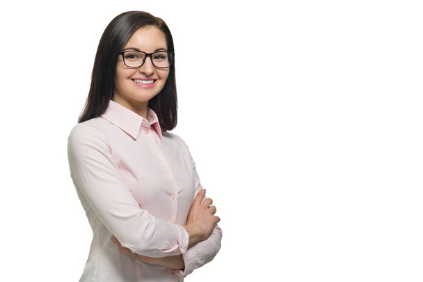 Portrait of young confident smiling woman in glasses with folded hands on white isolated background, copy space - Fotografie, Obrázek