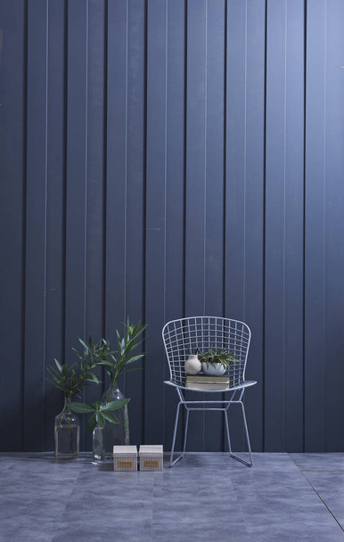 Modern dark blue  wall, textured wall, blue decorative wall,  and green plants in interior concept.  - Photo, Image