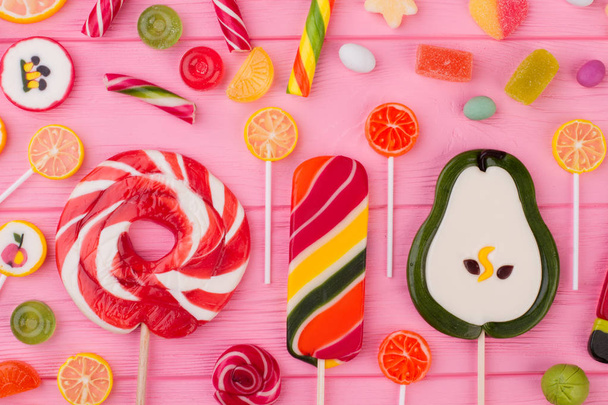 Composition with large sweet lollipops and candies. - Photo, Image