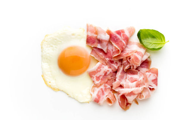 Eggs and baconon on the isolated background. - Zdjęcie, obraz