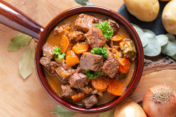 Food concept french classic beefs stew estouffade de boeuf with  - Photo, Image