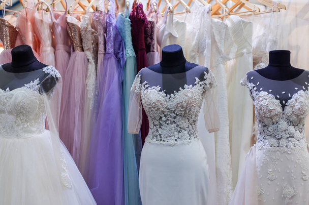 Several mannequins with wedding dresses. - Фото, изображение