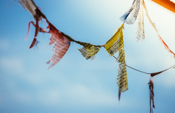 Tibetan prayer flag, blue sky - Foto, immagini