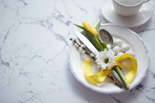 Spring Easter Table setting at white marble table. Top view - Фото, зображення