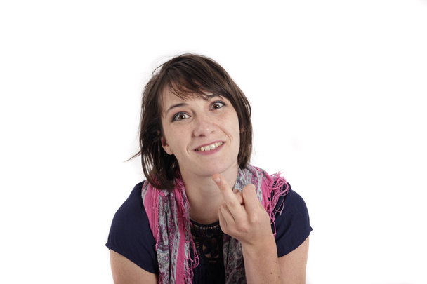 гумористичний портрет огф молода жінка з пальцем на роті
 - Фото, зображення