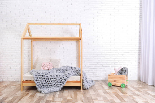 Stylish child room interior with house bed. Space for text - Fotoğraf, Görsel