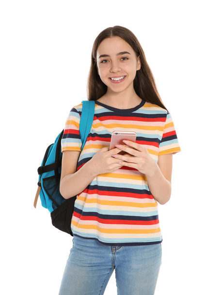 Beautiful teenager girl with mobile phone on white background - Φωτογραφία, εικόνα
