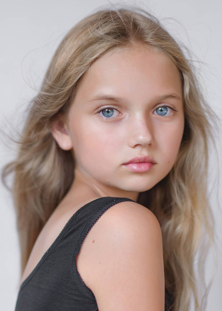 portrait of little model girl in studio - Φωτογραφία, εικόνα