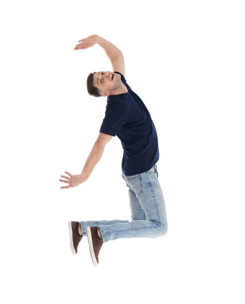 Man in casual clothes posing on white background - Foto, afbeelding