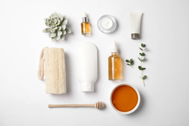 Flat lay composition with different body care products on white background - 写真・画像