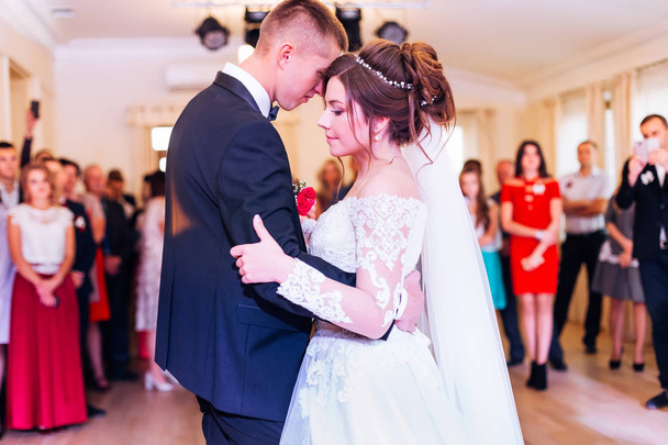 Beautiful wedding couple just married and dancing their first da - Photo, Image