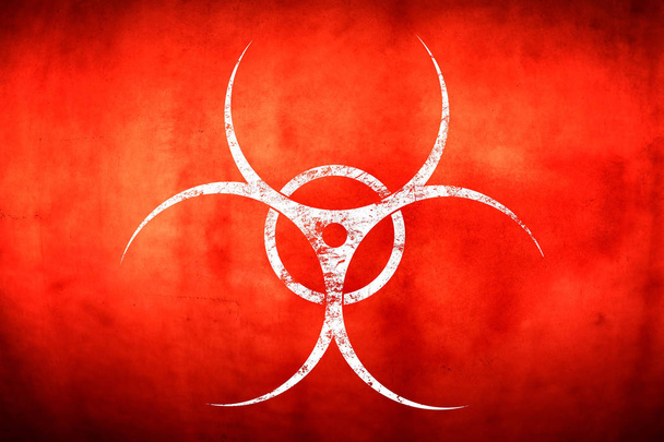 Σήμα βιολογικού κινδύνου λευκό πάνω από κόκκινο φόντο - Φωτογραφία, εικόνα