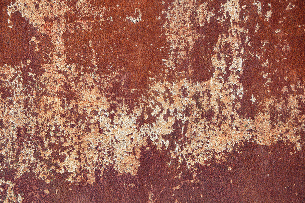 Rusty stain on the metal plate. Background texture of iron. - Photo, Image