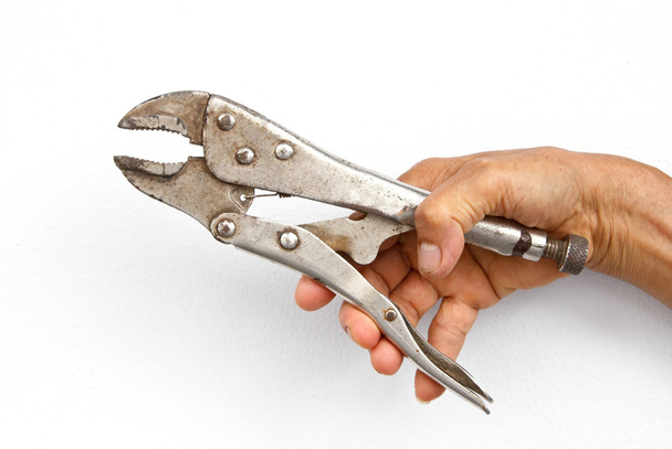 Holding monkey wrench in hand - Photo, Image