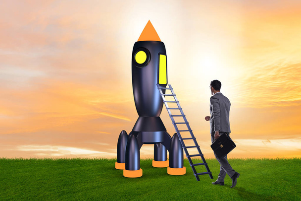 Jovem empresário embarque foguete espacial no conceito de start-up
 - Foto, Imagem