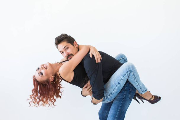 Romantic, passion, people concept - young couple dancing with passion - Zdjęcie, obraz