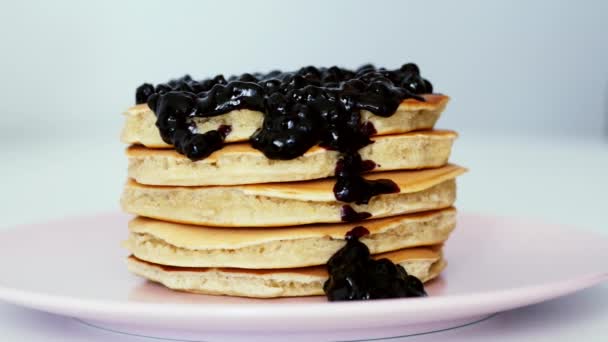 Sweet pancakes with berry jam, black currant - Footage, Video