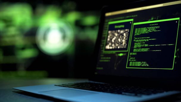 Programming scripts on laptop monitor, unauthorized remote hacking of server - Valokuva, kuva