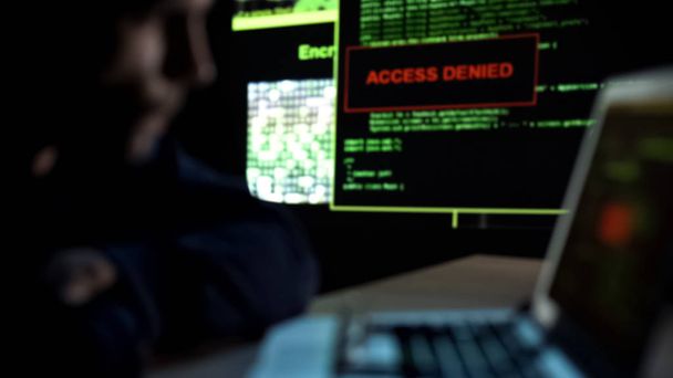 Administrator sees message Access denied on monitor, server hacking attempt - Fotoğraf, Görsel