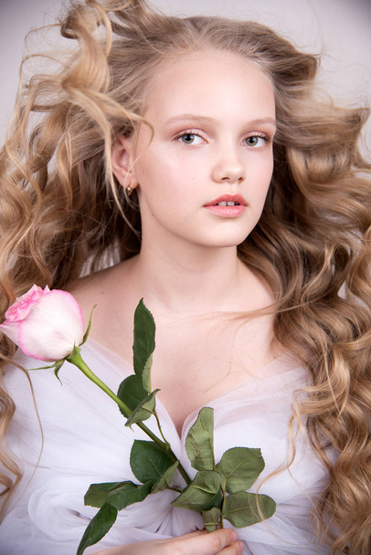 romantic image of a girl with a flower - Fotó, kép